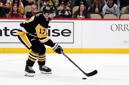 Oct 30, 2023; Pittsburgh, Pennsylvania, USA;  Pittsburgh Penguins right wing Bryan Rust (17) skates with the puck against the Anaheim Ducks during the first period at PPG Paints Arena. Mandatory Credit: Charles LeClaire-USA TODAY Sports