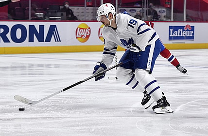 May 25, 2021; Montreal, Quebec, CAN; Toronto Maple Leafs forward Jason Spezza (19) takes a shot on the Montreal Canadiens net during the first period in game four of the first round of the 2021 Stanley Cup Playoffs at Bell Centre. Mandatory Credit: Eric Bolte-USA TODAY Sports