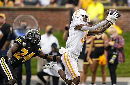 Oct 2, 2021; Columbia, Missouri, USA; Tennessee Volunteers wide receiver JaVonta Payton (3) catches a touchdown pass against Missouri Tigers defensive back Allie Green IV (24) during the first half at Faurot Field at Memorial Stadium. Mandatory Credit: Jay Biggerstaff-USA TODAY Sports
