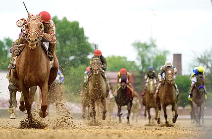 Rich Strike, left, with jockey Sonny Leon aboard, wins the Kentucky Derby. May 7, 2022

Dsc00576