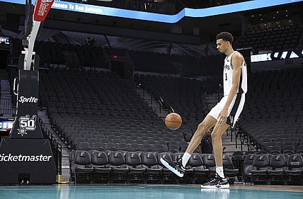 Jun 24, 2023; San Antonio, TX, USA; San Antonio Spurs draft pick Victor Wembanyama shoots around at a press conference at AT&T Center. Mandatory Credit: Troy Taormina-USA TODAY Sports