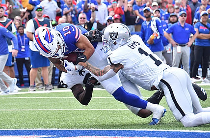 Sep 17, 2023; Orchard Park, New York, USA; Buffalo Bills wide receiver Khalil Shakir (10) scores a touchdown as he is tackled by Las Vegas Raiders safety Marcus Epps (1) in the second quarter at Highmark Stadium. Mandatory Credit: Mark Konezny-USA TODAY Sports