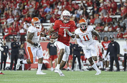 Sep 23, 2023; Houston, Texas, USA; Houston Cougars quarterback Donovan Smith (1) runs with the ball during the third quarter against the Sam Houston State Bearkats at TDECU Stadium. Mandatory Credit: Troy Taormina-USA TODAY Sports