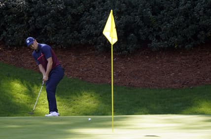 Nov 12, 2020; Augusta, Georgia, USA; Jordan Spieth putts on the 13th green during the first round of The Masters golf tournament at Augusta National GC. Mandatory Credit: Rob Schumacher-USA TODAY Sports