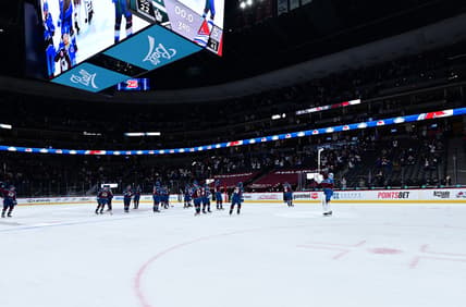 May 13, 2021; Denver, Colorado, USA; Members of the Colorado Avalanche celebrate defeating the Los Angeles Kings at Ball Arena. Mandatory Credit: Ron Chenoy-USA TODAY Sports
