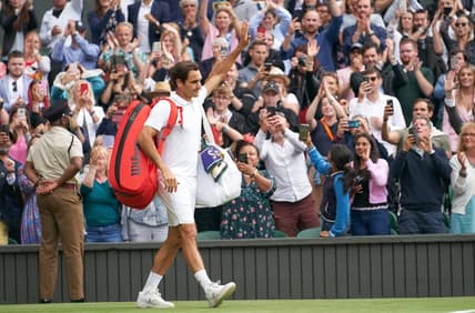 Jul 7, 2021; London, United Kingdom; Roger Federer (SUI) waving farewell to the Centre Court fans after losing to Hubert Hurkacz (POL) in the quarter finals at All England Lawn Tennis and Croquet Club. Mandatory Credit: Peter van den Berg-USA TODAY Sports