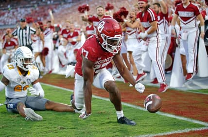 Oklahoma's Marvin Mims (17) celebrates his touchdown pass in front of Kent State's JoJo Evans (23) in the second quarter during the college football game between the University of Oklahoma and the Kent State Golden Flashes at the Gaylord Family Oklahoma Memorial Stadium in Norman, Okla., Saturday, Sept., 10, 2022.

Ou Vs Kent State Fb