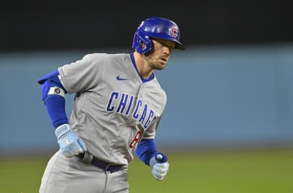 Apr 14, 2023; Los Angeles, California, USA;  Chicago Cubs left fielder Ian Happ (8) rounds the bases on a solo home run in the ninth inning against the Los Angeles Dodgers at Dodger Stadium. Mandatory Credit: Jayne Kamin-Oncea-USA TODAY Sports
