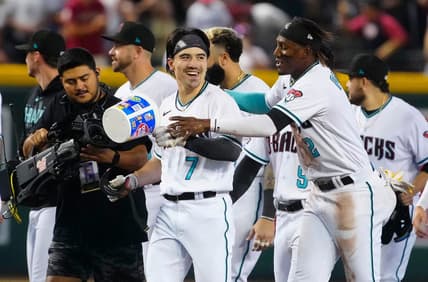 July 8, 2023; Phoenix, Ariz.; USA; Diamondbacks outfielder Corbin Carroll celerbates an RBI against the Pirates for a walk-off win in the 10th inning during a game at Chase Field.