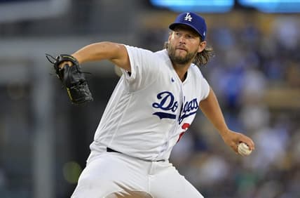 Aug 16, 2023; Los Angeles, California, USA;  Los Angeles Dodgers starting pitcher Clayton Kershaw (22) throws to the plate in the second inning against the Milwaukee Brewers at Dodger Stadium. Mandatory Credit: Jayne Kamin-Oncea-USA TODAY Sports