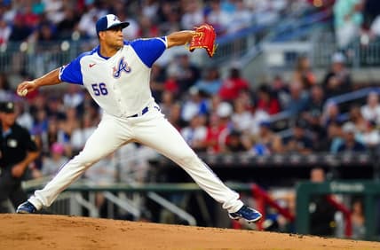 Aug 19, 2023; Cumberland, Georgia, USA; Atlanta Braves relief pitcher Yonny Chirinos (56) cycles through a pitch against the San Francisco Giants during the fourth inning at Truist Park. Mandatory Credit: John David Mercer-USA TODAY Sports