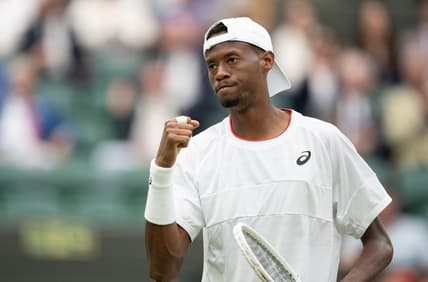 Jul 12, 2023; London, United Kingdom; Christopher Eubanks (USA) reacts to a point during his match against Daniil Medvedev on day ten of Wimbledon at the All England Lawn Tennis and Croquet Club.  Mandatory Credit: Susan Mullane-USA TODAY Sports