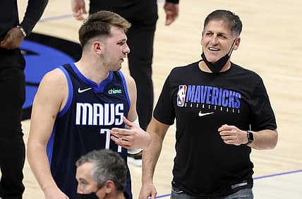 Apr 21, 2021; Dallas, Texas, USA;  Dallas Mavericks guard Luka Doncic (77) laughs with owner Mark Cuban after the game against the Detroit Pistons at American Airlines Center. Mandatory Credit: Kevin Jairaj-USA TODAY Sports