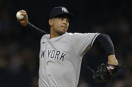 Jul 6, 2022; Pittsburgh, Pennsylvania, USA; New York Yankees relief pitcher Albert Abreu (84) throws a pitch against the Pittsburgh Pirates during the ninth inning at PNC Park. Mandatory Credit: Charles LeClaire-USA TODAY Sports