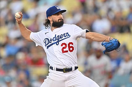 Jul 25, 2022; Los Angeles, California, USA; Los Angeles Dodgers starting pitcher Tony Gonsolin (26) throws a pitch in the second inning against the Washington Nationals at Dodger Stadium. Mandatory Credit: Jayne Kamin-Oncea-USA TODAY Sports