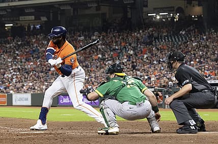 Aug 12, 2022; Houston, Texas, USA; Houston Astros designated hitter Yordan Alvarez (44) hits a single against the Oakland Athletics in the fifth inning at Minute Maid Park. Mandatory Credit: Thomas Shea-USA TODAY Sports