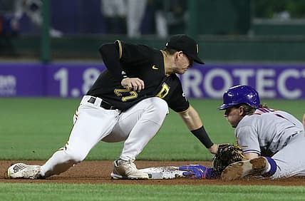 Sep 7, 2022; Pittsburgh, Pennsylvania, USA; New York Mets second baseman Jeff McNeil (1) steals second base ahead of a late tag by Pittsburgh Pirates shortstop Kevin Newman (27) during the fourth inning at PNC Park. Mandatory Credit: Charles LeClaire-USA TODAY Sports