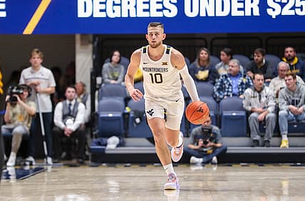 Nov 15, 2022; Morgantown, West Virginia, USA; West Virginia Mountaineers guard Erik Stevenson (10) dribbles the ball during the second half against the Morehead State Eagles at WVU Coliseum. Mandatory Credit: Ben Queen-USA TODAY Sports