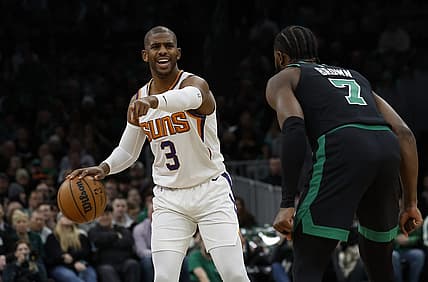 Feb 3, 2023; Boston, Massachusetts, USA; Phoenix Suns guard Chris Paul (3) directs teammates against the Boston Celtics during the first quarter at TD Garden. Mandatory Credit: Winslow Townson-USA TODAY Sports