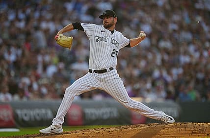 Jul 14, 2023; Denver, Colorado, USA; Colorado Rockies starting pitcher Austin Gomber (26) pitches in fourth inning against the New York Yankees at Coors Field. Mandatory Credit: Ron Chenoy-USA TODAY Sports