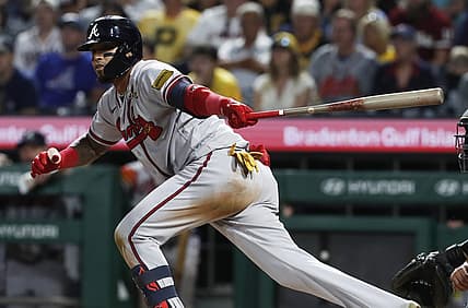 Aug 8, 2023; Pittsburgh, Pennsylvania, USA;  Atlanta Braves shortstop Orlando Arcia (11) hits a game winning two-run double against the Pittsburgh Pirates during the ninth inning at PNC Park. Atlanta won 8-6. Mandatory Credit: Charles LeClaire-USA TODAY Sports