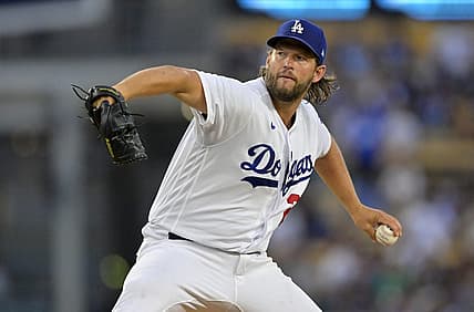 Aug 16, 2023; Los Angeles, California, USA;  Los Angeles Dodgers starting pitcher Clayton Kershaw (22) throws to the plate in the second inning against the Milwaukee Brewers at Dodger Stadium. Mandatory Credit: Jayne Kamin-Oncea-USA TODAY Sports