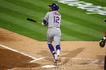 Apr 5, 2021; Philadelphia, Pennsylvania, USA; New York Mets shortstop Francisco Lindor (12) watches a fly ball in the third inning against the Philadelphia Phillies at Citizens Bank Park. Mandatory Credit: Kyle Ross-USA TODAY Sports