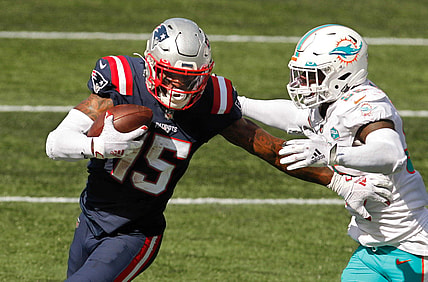 Published Caption:  Patriots receiver N   Keal Harry fends off Dolphins defender Jerome Baker after a third-quarter reception in Week 1. [The Providence Journal / Kris Craig] Original Caption:  Patriots receiver N'Keal Harry fends off Dolphins defender Jerome Baker after a third-quarter reception in Week 1.

Patriots Expecting More From N Keal Harry