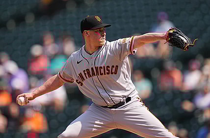 Sep 8, 2021; Denver, Colorado, USA; San Francisco Giants starting pitcher Anthony DeSclafani (26) in the first inning against the Colorado Rockies at Coors Field. Mandatory Credit: Ron Chenoy-USA TODAY Sports