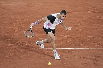 Jun 4, 2021; Paris, France;  Laslo Djere (SRB) in action during his match against Alexander Zverev (GER) on day six of the French Open at Stade Roland Garros. Mandatory Credit: Susan Mullane-USA TODAY Sports