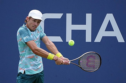Aug 31, 2022; Flushing, NY, USA;  Alex de Minaur of Australia hits a shot against Cristian Garin of Chile on day three of the 2022 U.S. Open tennis tournament at USTA Billie Jean King Tennis Center. Mandatory Credit: Jerry Lai-USA TODAY Sports