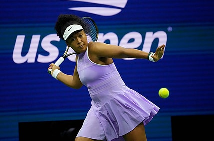 Aug 30, 2022; Flushing, NY, USA; Naomi Osaka of Japan hits to Danielle Collins of the USA on day two of the 2022 U.S. Open tennis tournament at USTA Billie Jean King National Tennis Center. Mandatory Credit: Robert Deutsch-USA TODAY Sports