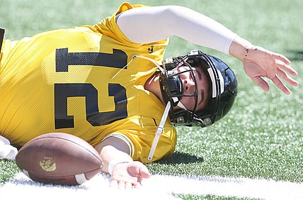 Iowa quarterback Cade McNamara warms up before scrimmaging during Kids' Day at Kinnick at Kinnick Stadium on Saturday, Aug. 12, 2023, in Iowa City, Iowa