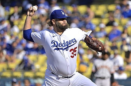 Sep 24, 2023; Los Angeles, California, USA;  Los Angeles Dodgers starting pitcher Lance Lynn (35) delivers in the first inning against the San Francisco Giants at Dodger Stadium. Mandatory Credit: Jayne Kamin-Oncea-USA TODAY Sports