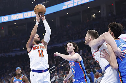 Dec 27, 2023; Oklahoma City, Oklahoma, USA; New York Knicks guard Jalen Brunson (11) shoots against the Oklahoma City Thunder during the first quarter at Paycom Center. Mandatory Credit: Alonzo Adams-USA TODAY Sports