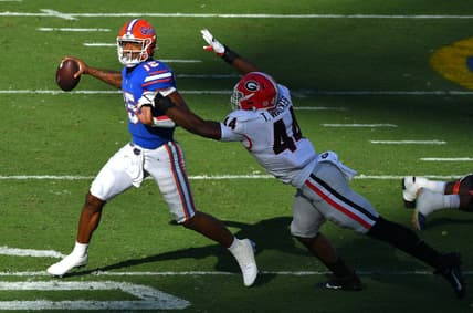 Georgia Bulldogs defensive lineman Travon Walker (44) chases down Florida Gators quarterback Anthony Richardson (15) during second quarter action. The Florida Gators went into the half trailing the Georgia Bulldogs 24 to 0. The Florida Gators were the home team for this years annual Florida vs Georgia college football rivalry game at TIAA Bank field in Jacksonville, Florida Saturday, October 30, 2021. [Bob Self/Florida Times-Union]

Georgia Defense