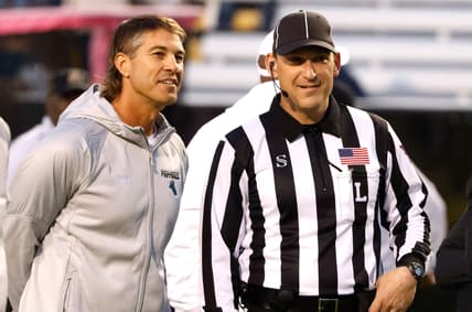Oct 20, 2021; Boone, North Carolina, USA; Coastal Carolina Chanticleers head coach Jamey Chadwell (left) talks with an official before the game against the Appalachian State Mountaineers at Kidd Brewer Stadium. Mandatory Credit: Reinhold Matay-USA TODAY Sports