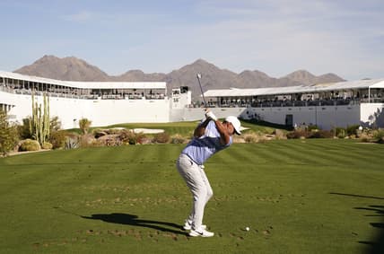 Feb 7, 2021; Scottsdale, Arizona, USA; Brooks Koepka plays his tee shot on the 16th hole during the final round of the Waste Management Phoenix Open at TPC Scottsdale. Mandatory Credit: Rob Schumacher-USA TODAY Sports