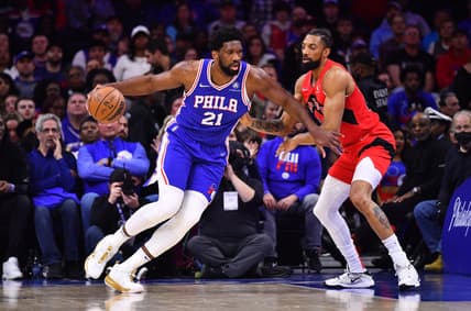 Mar 20, 2022; Philadelphia, Pennsylvania, USA; Philadelphia 76ers center Joel Embiid (21) drives against Toronto Raptors center Khem Birch (24) in the first quarter at Wells Fargo Center. Mandatory Credit: Kyle Ross-USA TODAY Sports