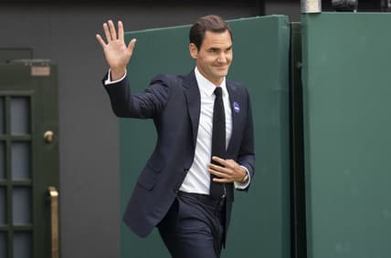 Jul 3, 2022; London, United Kingdom; On the inaugural middle Sunday for play, Wimbledon celebrates 100 years since their move to Church Road and the centenary of Centre Court. Past champions were on court for this special ceremony on day seven at All England Lawn Tennis and Croquet Club. Shown here: Roger Federer (SUI). Mandatory Credit: Susan Mullane-USA TODAY Sports