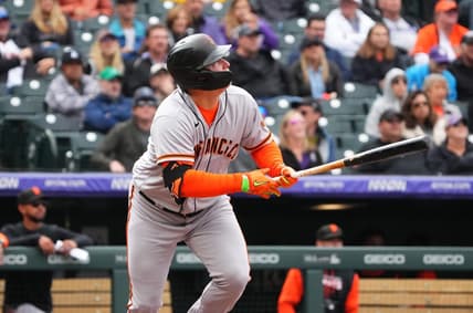 Sep 22, 2022; Denver, Colorado, USA; San Francisco Giants left fielder Joc Pederson (23) singles in the sixth inning against the Colorado Rockies at Coors Field. Mandatory Credit: Ron Chenoy-USA TODAY Sports