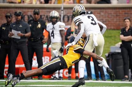 Oct 22, 2022; Columbia, Missouri, USA; Vanderbilt Commodores wide receiver Quincy Skinner Jr. (3) runs the ball as Missouri Tigers defensive back Kris Abrams-Draine (14) makes the tackle during the first half of the game at Faurot Field at Memorial Stadium. Mandatory Credit: Denny Medley-USA TODAY Sports