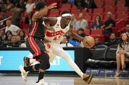 Oct 22, 2022; Miami, Florida, USA; Toronto Raptors forward Pascal Siakam (43) drives against Miami Heat guard Kyle Lowry (7) in the second half at FTX Arena. Mandatory Credit: Jim Rassol-USA TODAY Sports