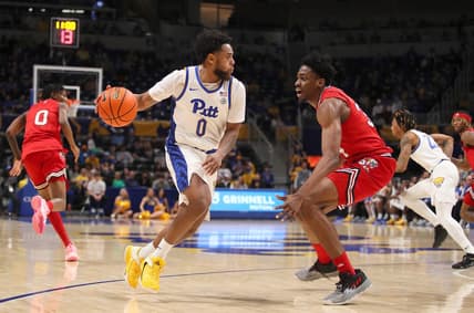 Pittsburgh Panthers Nelly Cummings (0) steals the ball from Louisville Cardinals Emmanuel Okorafor (34) during the second half on February 7, 2023 at the Petersen Events Center in Pittsburgh, PA.

Pittsburgh Panthers Vs Louisville Mens Basketball
