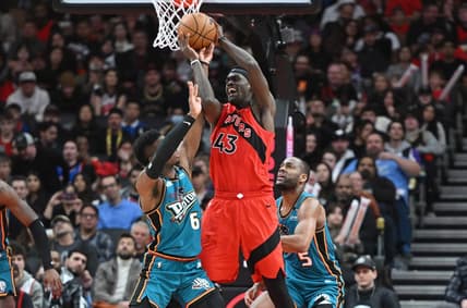 Feb 12, 2023; Toronto, Ontario, CAN;    Toronto Raptors forward Pascal Siakam (43) holds the ball away from Detroit Pistons guards Hamidou Diallo (6) and Alec Burks (5) in the second half at Scotiabank Arena. Mandatory Credit: Dan Hamilton-USA TODAY Sports