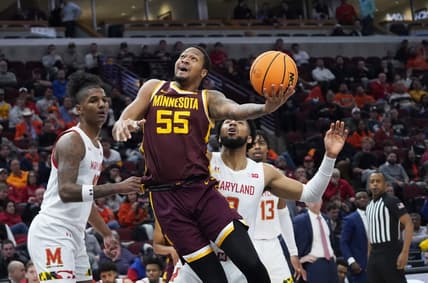 Mar 9, 2023; Chicago, IL, USA; Maryland Terrapins forward Julian Reese (10) defends Minnesota Golden Gophers guard Ta'lon Cooper (55) during the first half at United Center. Mandatory Credit: David Banks-USA TODAY Sports