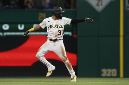 May 22, 2023; Pittsburgh, Pennsylvania, USA;  Pittsburgh Pirates shortstop Tucupita Marcano (30) reacts as he circles the bases on a grand slam home run against the Texas Rangers during the seventh inning at PNC Park. Mandatory Credit: Charles LeClaire-USA TODAY Sports