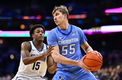 Mar 9, 2024; Philadelphia, Pennsylvania, USA; Creighton Bluejays guard Baylor Scheierman (55) controls the ball against Villanova Wildcats guard Jordan Longino (15) in the first half at Wells Fargo Center. Mandatory Credit: Kyle Ross-USA TODAY Sports