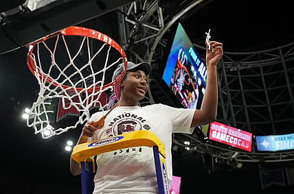 Apr 3, 2022; Minneapolis, MN, USA; South Carolina Gamecocks forward Aliyah Boston (4) cuts the nets as she celebrates their 64-49 victory over the UConn Huskies in the Final Four championship game of the women's college basketball NCAA Tournament at Target Center. Mandatory Credit: Kirby Lee-USA TODAY Sports