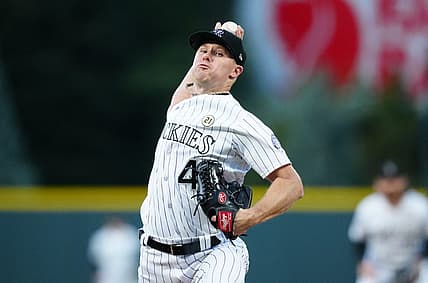 Sep 15, 2023; Denver, Colorado, USA; Colorado Rockies starting pitcher Chase Anderson (45) delivers a pitch in the first inning against the San Francisco Giants at Coors Field. Mandatory Credit: Ron Chenoy-USA TODAY Sports